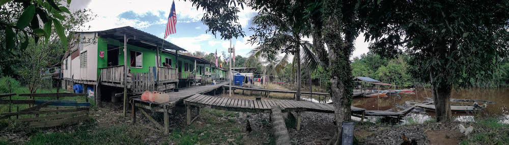 A picturesque scene of Albert's community longhouse, Rumah Iman